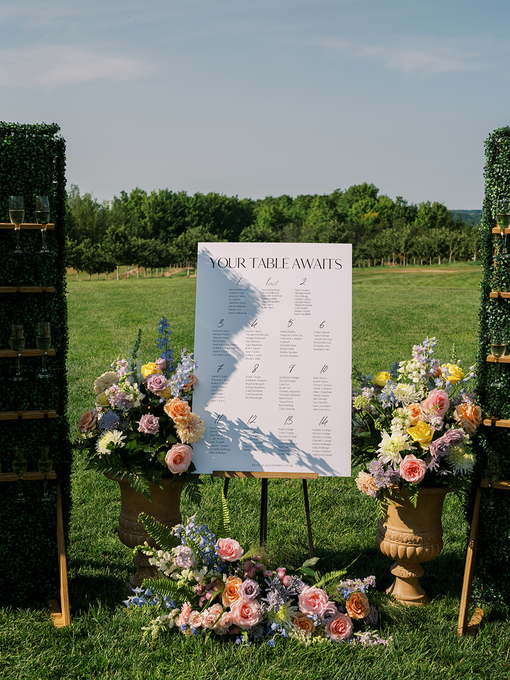 Table seating chart at Abby & Jake's Bay View Wedding