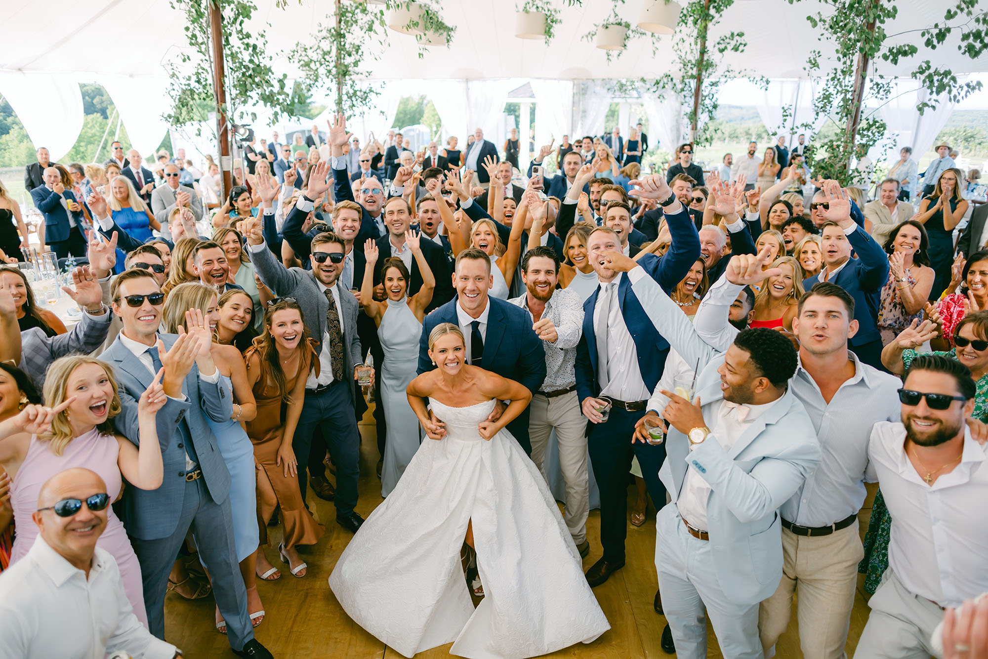 meg & randy with friends on dance floor while getting married at bay view wedding